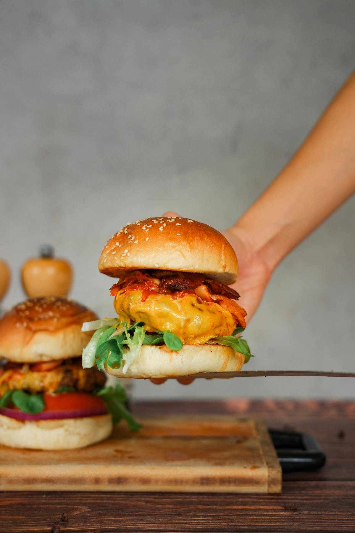 A cosy corner in a restaurant with a table set for two, ready for guests to arrive.